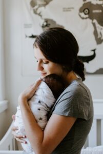woman holding baby