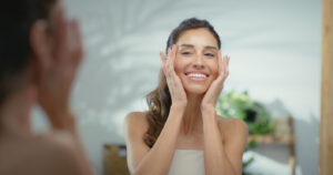 woman looking in mirror